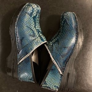 Size 37 dansko clogs. Worn at front (in pic)